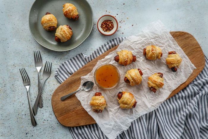 Merguez Rolls with Goat Cheese and Apricot Sauce