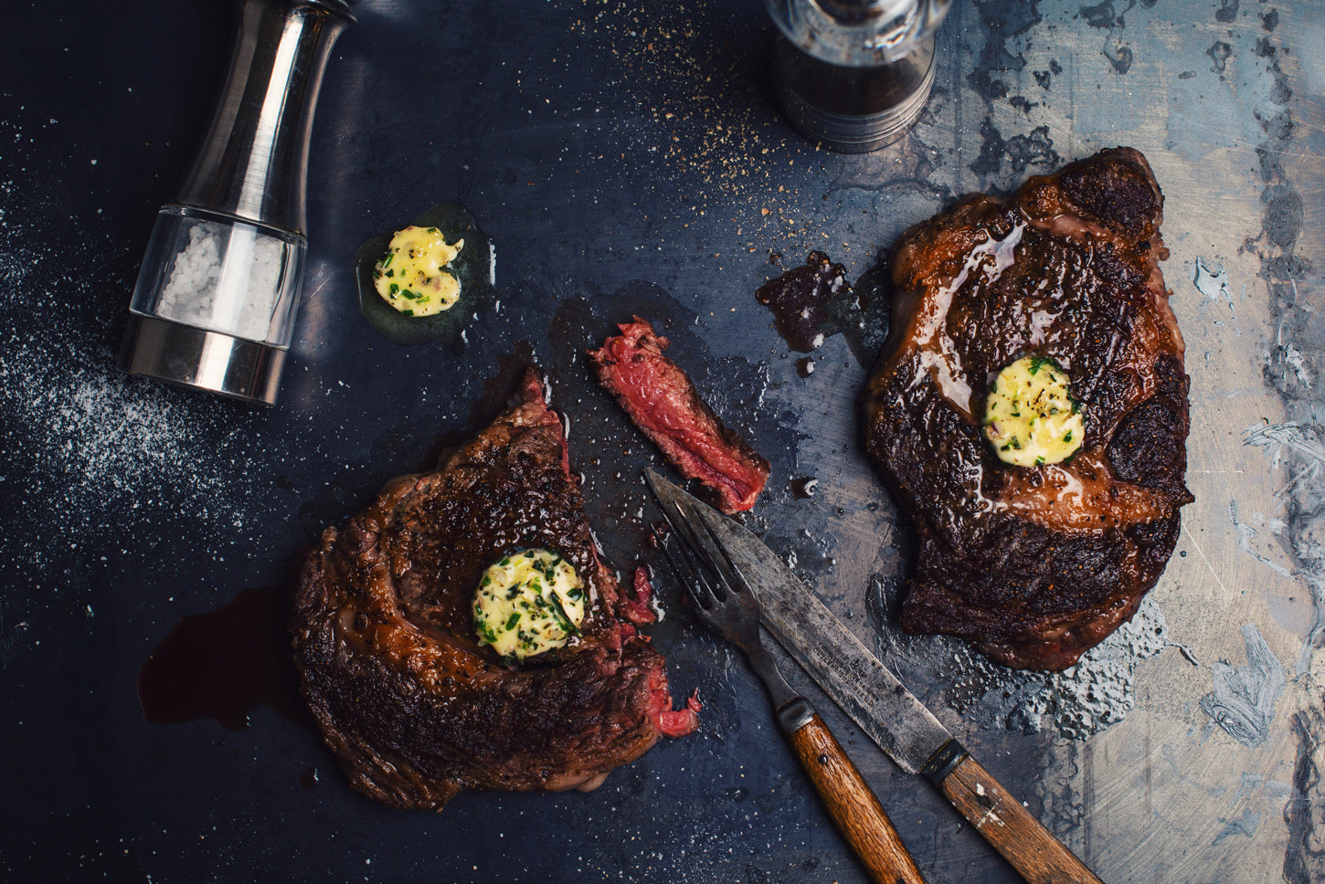 two steaks with butter