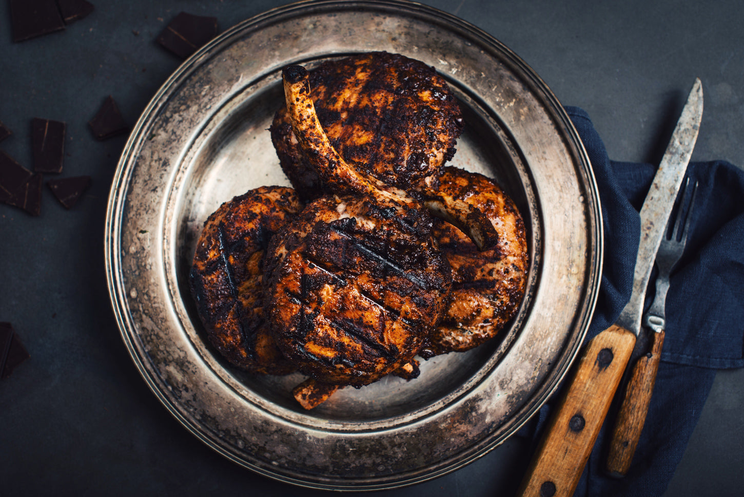 pork chops with bones in silver plate