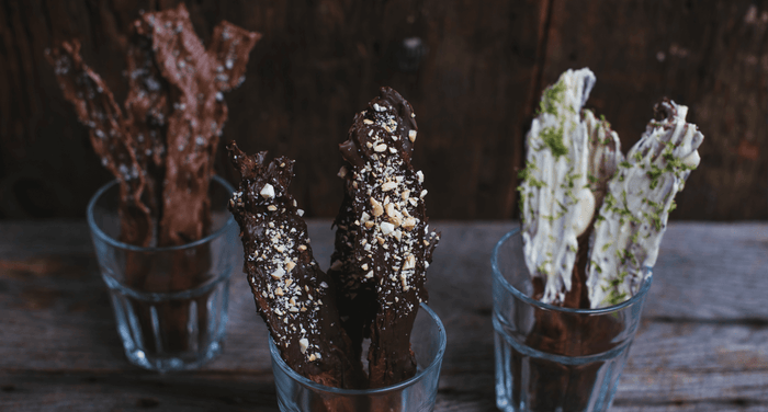 chocolate covered bacon bouquets in glasses