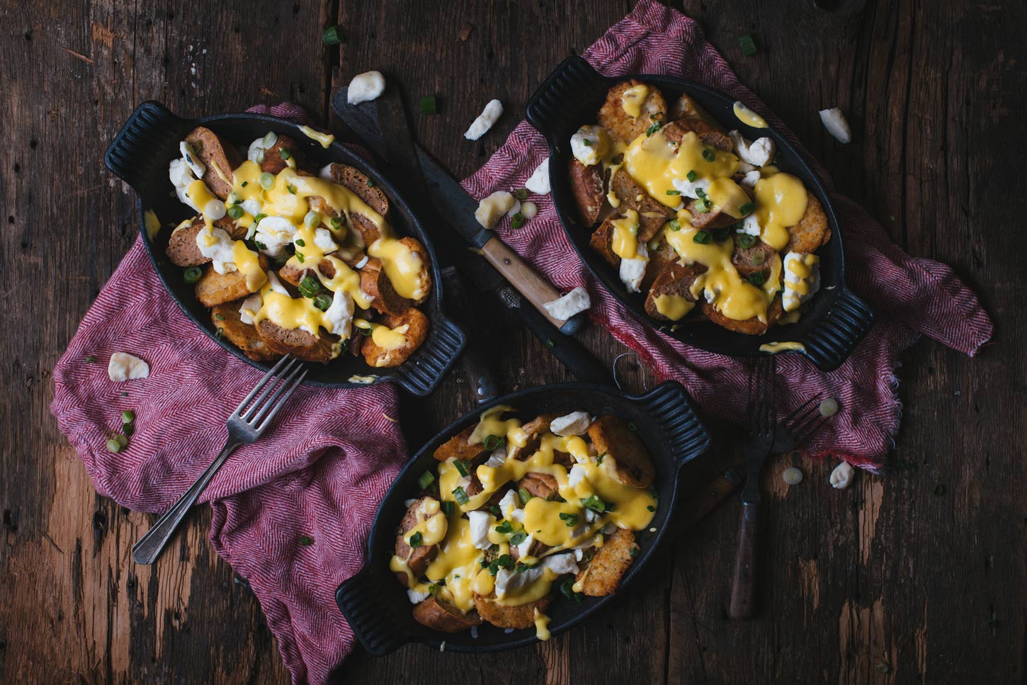 breakfast poutine with sausages, potatoes and cheese