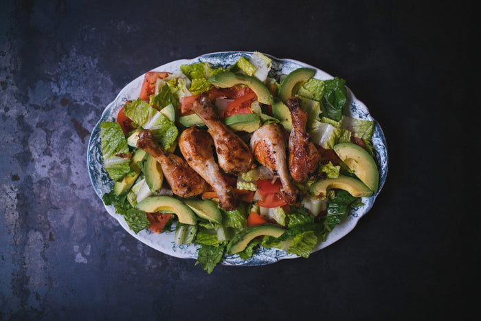 green salad with chicken drumsticks