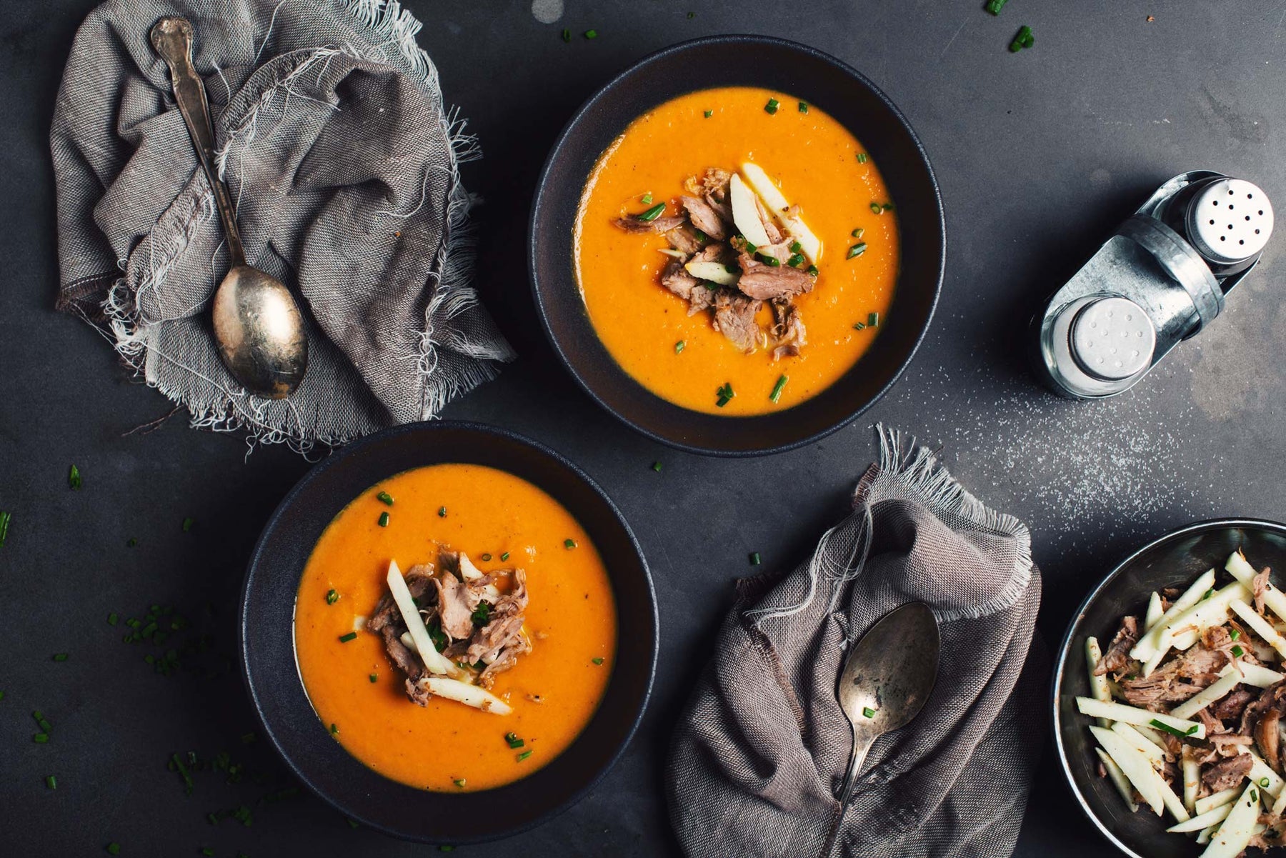 carrot soup with duck topping